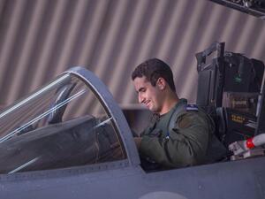 In a handout picture released by the official Saudi Press Agency (SPA), Saudi Arabian air force pilot Prince Khaled bin Salman sits in the cockpit of a fighter jet at an undisclosed location on September 23, 2014. (AFP)