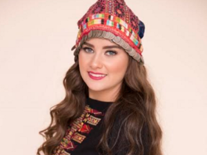 Natalie Rantissi in her traditional Palestinian costume. (Hajjajcartoons.com)