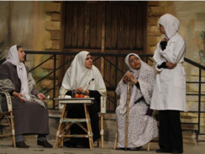 Palestinian women perform in a play in Gaza city (AFP/File)