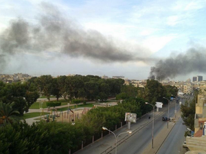 Smoke billows over residential neighbourhoods in Benghazi, following fierce clashes between the army and militants in the eastern Libyan city. (Image courtesy of Twitter/Wajid Saadi)
