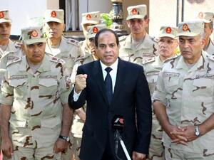 Egypt's President Abdel Fattah al-Sisi surrounded by top military generals after an emergency meeting of the Supreme Council of the armed Forces in Cairo. (AFP/ File Photo)