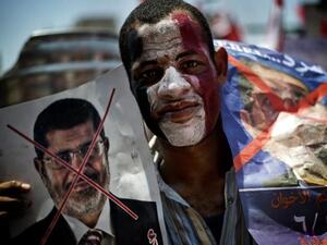 Protester calls for the ouster of Egyptian President Mohamed Morsi in Cairo on June 30 (AFP)