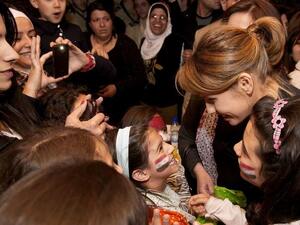 Asma Assad and her children attend a fundraising event in Damascus Asma Assad and her children attend a fundraising event in Damascus