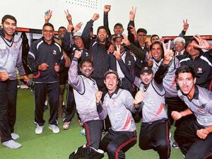 UAE team celebrate the historic moment by qualifying for the ICC Cricket World Cup 2015 at Mainpower Oval grou (Photo: ICC)