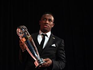 UAE player Ahmad Khalil, winner of the AFC Player of the Year Award poses with the trophy at the Asian Football Confederation (AFC)'s Annual Awards in Gurgaon, on the outskirts of New Delhi on November 29, 2015. AFP PHOTO / SAJJAD HUSSAIN
SAJJAD HUSSAIN / AFP