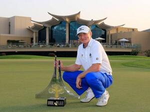 Chris Williams poses with the Sharjah Senior Masters trophy. (Photo: Sharjah Senior Masters)