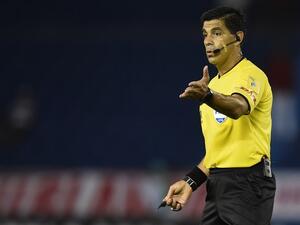 Paraguay referee Enrique Caceres