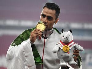 Gold medallist Iran's Hossein Keyhani celebrates during the victory ceremony for the men's 3000m steeplechase athletics event during the 2018 Asian Games in Jakarta on August 27, 2018.
Jewel SAMAD / AFP