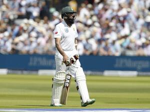South Africa's Hashim Amla walks back to the pavilion after losing his wicket on the second day of the first Test match between England and South Africa at Lord's Cricket Ground in central London on July 7, 2017.
Ian KINGTON / AFP