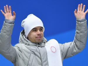 Russia's bronze medallist Semen Elistratov waves on the podium during the medal ceremony for the Men's short track 1500m at the Pyeongchang Medals Plaza during the Pyeongchang 2018 Winter Olympic Games in Pyeongchang on February 11, 2018.
Martin BERNETTI / AFP