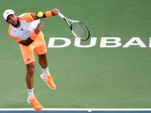 Fernando Verdasco of Spain returns the ball to Robin Haase of Netherlands during their ATP semi-final tennis match as part of the Dubai Duty Free Championships on March 3, 2017.

KARIM SAHIB / AFP