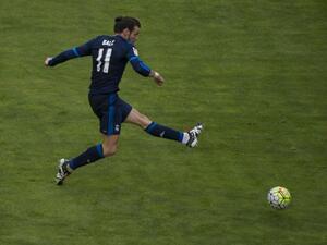 Real Madrid's Welsh forward Gareth Bale scores during the Spanish league football match Rayo Vallecano de Madrid vs Real Madrid CF at the Vallecas stadium in Madrid on April 23, 2016.
CURTO DE LA TORRE / AFP