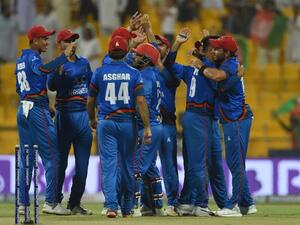 Afghan cricket team celebrates after winning during the one day international (ODI) Asia Cup cricket match between Sri Lanka and Afghanistan at the Sheikh Zayed Stadium in Abu Dhabi on September 17, 2018. Afghanistan won the match by 91 runs.
ISHARA S. KODIKARA / AFP