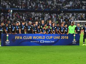 Runner up Abu Dhabi's Al Ain players look at the trophy ceremony after losing the FIFA Club World Cup final football match Spain's Real Madrid vs Abu Dhabi's Al Ain at the Zayed Sports City Stadium in Abu Dhabi, the capital of the United Arab Emirates, on December 22, 2018.
Giuseppe CACACE / AFP