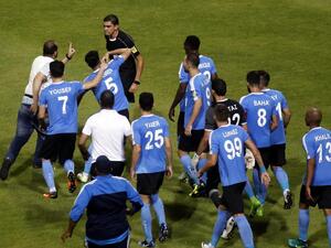 Police intervened after Egyptian referee Ibrahim Nour El-Din was assaulted by players and technical staff.