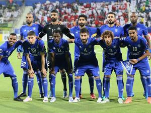 UAE's Al-Nasr club players pose for a picture ahead of their match against Qatar's El-Jaish club during the Asian Champions League quarter-final football match at the Rashid Al-Makhtoum Stadium in Dubai on September 14, 2016.
NEZAR BALOUT / AFP