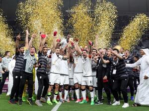 Al-Sadd's players celebrate their victory in the Qatar Emir Cup Final football match against Al-Rayyan at the Khalifa International Stadium in Doha on May 19, 2017. Al-Sadd defeated Al-Rayyan 2-1.
KARIM JAAFAR / AFP