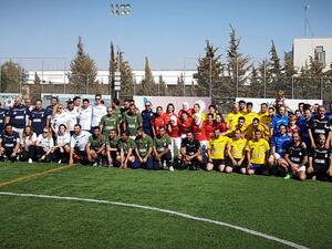 Participants in the ‘Score for Democracy’ event, organized by the EU, pose for a group photo, on Saturday (Photo by Amjad Ghsoun)