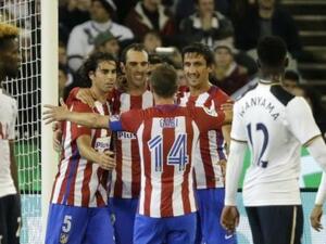 لاعبو أتلتيكو يحتفلون بهدف غودين