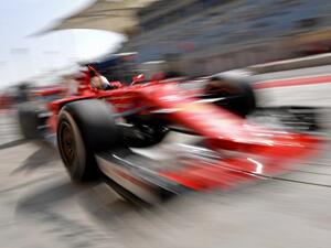 Ferrari's German driver Sebastian Vettel steers back to the pit lane during a practice session ahead of the Formula One Bahrain Grand Prix at the Sakhir circuit in the desert south of the Bahrain's capital, Manama on April 14, 2017.
ANDREJ ISAKOVIC / AFP