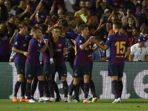 لاعبو برشلونة خلال المباراة مع توتنهام ضمن الكأس الدولية للأبطال