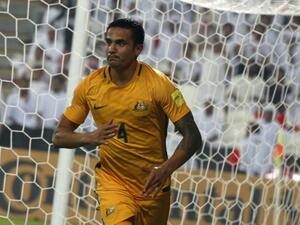 Tim Cahill helped Australia scrape past Syria and book a World Cup qualifying play-off against CONCACAF's fourth-place team. 