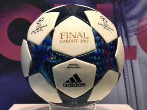 The match ball for the football Champions League final 2017 in Cardiff produced by the German sportswear maker Adidas is on display in the company headquarters in Herzogenaurach, southern Germany, during the annual press conference on March 8, 2017.
Christof STACHE / AFP
