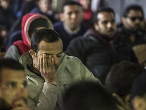 Egyptian fans react as they watch on a screen the Africa Cup of Nations (CAN) football match between Egypt and Cameroon on February 5, 2017, in the capital Cairo, during the 2017 Africa Cup of Nations final in Gabon.
KHALED DESOUKI / AFP
