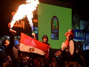 Egyptian fans celebrate after the 2017 Africa Cup of Nations semi-final football match between Burkina Faso and Egypt, in Cairo on February 1, 2017.

MOHAMED EL-SHAHED / AFP
