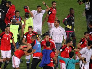 Egypt's team players celebrate wining against Congo's team during their World Cup 2018 Africa qualifying match between Egypt and Congo at the Borg el-Arab stadium in Alexandria on October 8, 2017. TAREK ABDEL HAMID / AFP