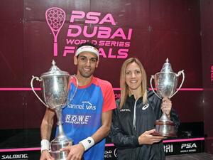 Mohamed Elshorbagy and Laura Massaro with their trophies after winning the men's and women's titles respectively in the PSA Dubai World Series Finals. (AN photo)