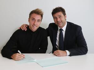 المدرب ماوريسيو بوتشيتينو رفقة إيريكسن