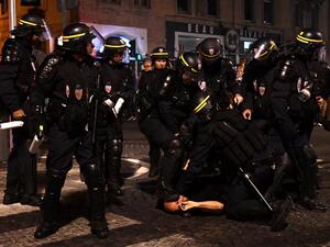 A man is arrested by riot police in Marseille, southern France, on June 10, 2016, ahead of England's Euro 2016 football match against Russia on June 11, 2016.
ANNE-CHRISTINE POUJOULAT / AFP