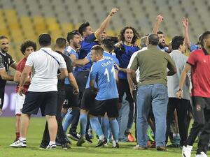 Jordan’s al-Faisaly players celebrate after winning the Arab Club championship semifinal against Egypt’s al-Ahly during the Arab Club championship semifinal match at Borg el-Arab Stadium near Alexandria on August 2, 2017.
MOHAMMED HASSANEEN / AFP