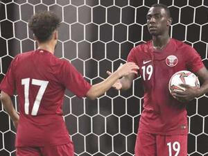 Qatar’s Almoez Ali (right) celebrates with a teammate after scoring against Jordan in a friendly match ahead of next month’s Asian Cup in the UAE. (Photo: Gulf Times)