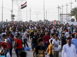 Football fans arrive at Basra Sports City stadium in the southern Iraqi city on March 21, 2018 to attend the international friendly match between Iraq and Qatar.
HAIDAR MOHAMMED ALI / AFP