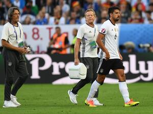 Germany's midfielder Sami Khedira leaves the pitch during the Euro 2016 quarter-final football match between Germany and Italy at the Matmut Atlantique stadium in Bordeaux on July 2, 2016.
PATRIK STOLLARZ / AFP