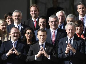 New French President Emmanuel Macron (C) poses next to the president of the IOC Evaluation Commission for the 2024 Olympics Patrick Baumann (L) and French member of the IOC Guy Drut (R) at the Elysee Palace in Paris after a meeting with members of the International Olympic Committee (IOC) Evaluation Commission, on May 16, 2017, prior to a vote for the 2024 Summer Olympics.
STEPHANE DE SAKUTIN / AFP