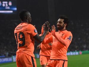 Liverpool's Senegalese midfielder Sadio Mane (L) celebrates with Liverpool's Egyptian midfielder Mohamed Salah after scoring their third goal during the UEFA Champions League round of sixteen first leg football match between FC Porto and Liverpool at the Dragao stadium in Porto, Portugal on February 14, 2018. Liverpool won the game 5-0.
Francisco LEONG / AFP