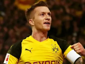 رويس يقود دورتموند لفوز مثير