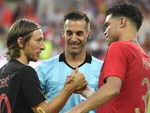 بيبي يصافح لوكا مودريتش