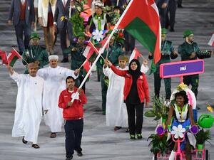 Oman's flagbearer Hamed al-Khatri leads his delegation during the opening ceremony of the Rio 2016 Olympic Games at the Maracana stadium in Rio de Janeiro on August 5, 2016.
PEDRO UGARTE / AFP