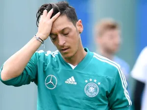  Although the player has hinted that he could be open to a return to the national side, his coach is not of the same opinion 