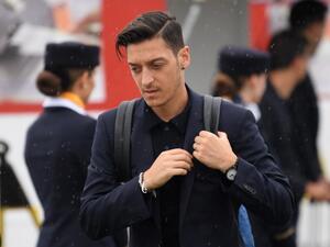 The former Gunners star believes one lucrative deal is making it difficult to snap up other players, with the club "a million miles" from competing