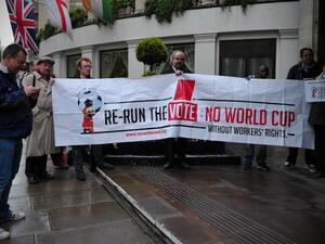 Protesters demonstrate against the perceived exploitation of workers in Qatar, the location of the 2022 World Cup, before a UEFA Congress in central London on May 24, 2013. AFP PHOTO/CARL COURT
CARL COURT / AFP