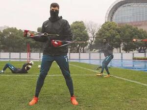 Qatari players warm up for Vietnam in cold Changzhou (Photo: Gulf Times)