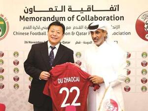 QFA president Sheikh Hamad bin Khalifa bin Ahmed al-Thani (right) with Vice Sports Minister of China and CFA acting president Du Zhaocai. (Photo: Gulf Times)