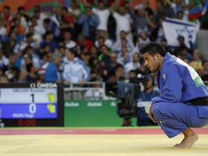 Israel's Sagi Muki reacts after losing to Azerbaijan's Rustam Orujov during their men's -73kg judo contest semifinal B match of the Rio 2016 Olympic Games in Rio de Janeiro on August 8, 2016.
Jack GUEZ / AFP