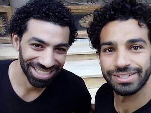 The duo had identical smiles, identical hair, identical beards, and was wearing identical shirts to make things more confusing.