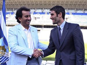 عبد الله آل ثاني (يسار)